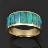 Opal ring inlaid with 7 pieces of Australian opal by Hileman.