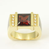 Garnet ring with black onyx and lab created opal in 14k gold.