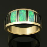 Man's black onyx and Australian opal wedding band in 14k gold by The Hileman Collection.