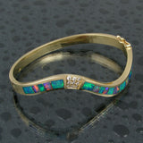 Opal bracelet with diamonds by Hileman