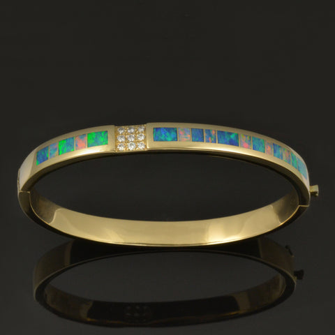 Australian Opal bracelet with diamond accents in 14k gold by The Hileman Collection.