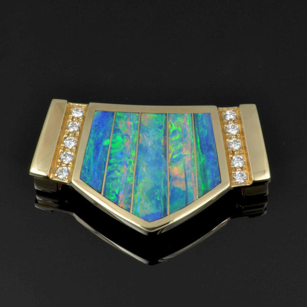 Australian opal slide pendant in 14k yellow gold with diamonds.