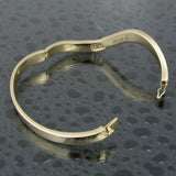 Hinged opal bracelet with diamonds by Hileman.