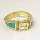 Opal and white sapphire ring in 14k gold.