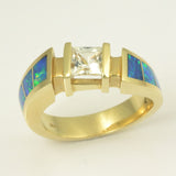 Opal and sapphire ring in gold.