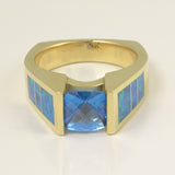 Australian opal ring with blue topaz in yellow gold
