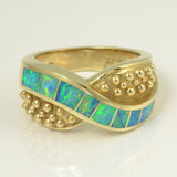 Australian opal ring with 8 pieces of opal inlay.