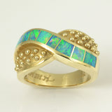 Australian opal inlay ring in 14k gold.