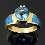 Australian opal engagement ring with blue topaz in gold