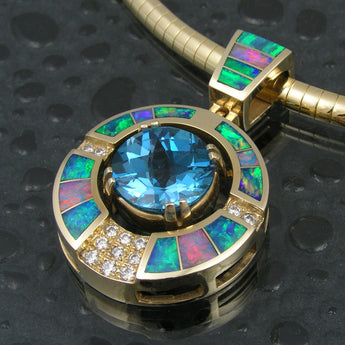 Australian opal pendant with blue topaz center by Hileman