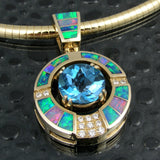 Topaz, diamond and opal pendant in 14k gold by Hileman.