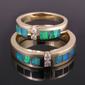 Australian opal wedding ring set with diamonds set in 14k gold by Hileman.